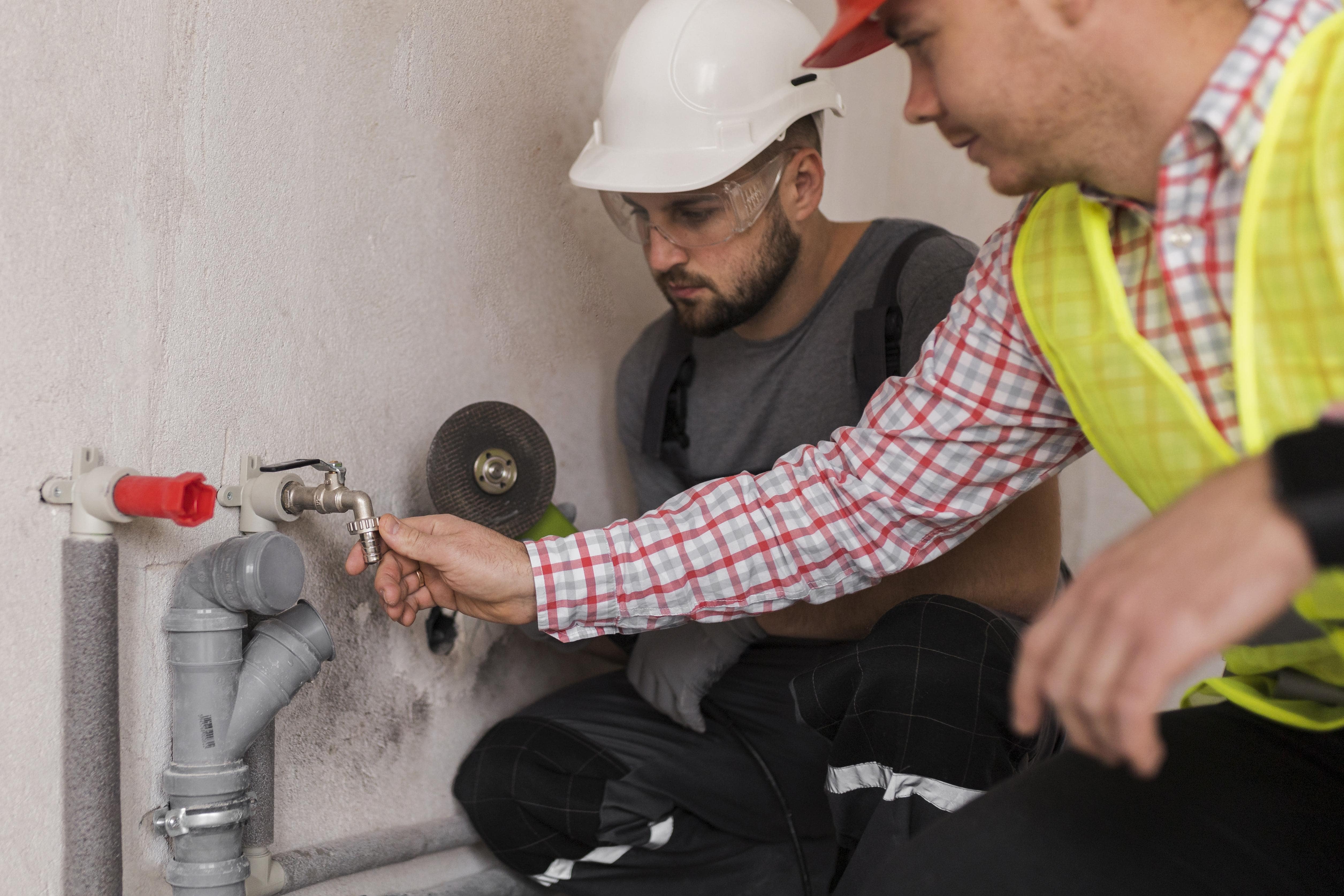 close-up-men-working-together-min